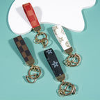 Leather Print Wristlet Keychain with Checkered and Monochrome Patterns 2