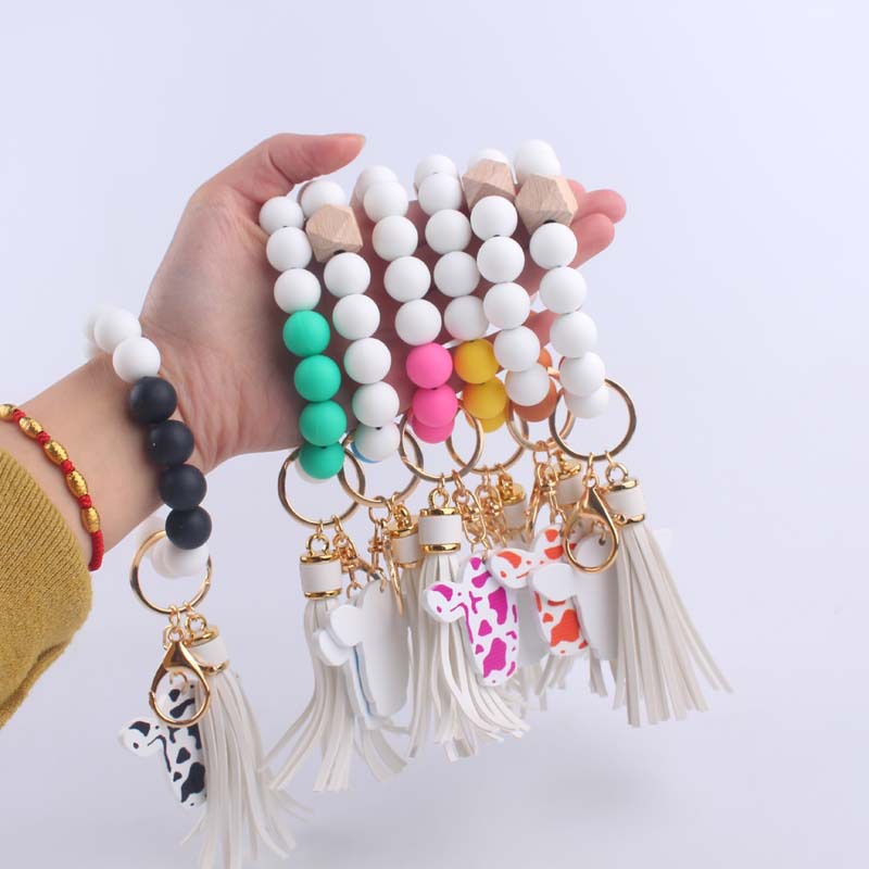 Silicone Beaded Wristlet Keychain with Leather Tassel and Cow Print Charm 2