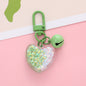Acrylic Heart Keychain with Iridescent Flakes and Colorful Bell Charm 9