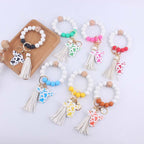 Silicone Beaded Wristlet Keychain with Leather Tassel and Cow Print Charm
