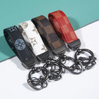 Leather Print Wristlet Keychain with Checkered and Monochrome Patterns