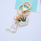 Metal Cherry Blossom Rabbit and Cat Keychain Gold Floral Design 3