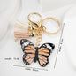 Metal Butterfly Keychain with Peach Gray Wings and Suede Tassels 5