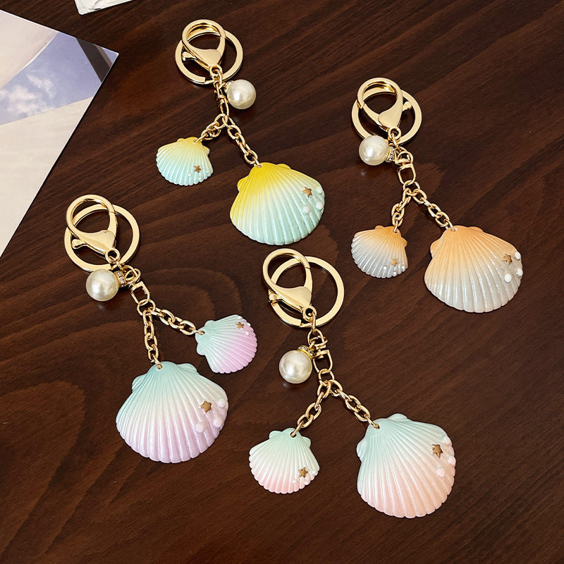 Gradient Shell Alloy Keychain with Pearl and Star Accents