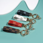 Leather Print Wristlet Keychain with Checkered and Monochrome Patterns 3