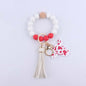 Silicone Beaded Wristlet Keychain with Leather Tassel and Cow Print Charm 7