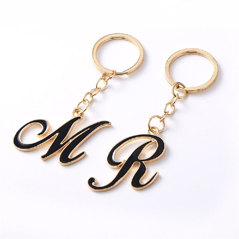 Metal Fashion Letter Keychain Black and Gold Script Design 2