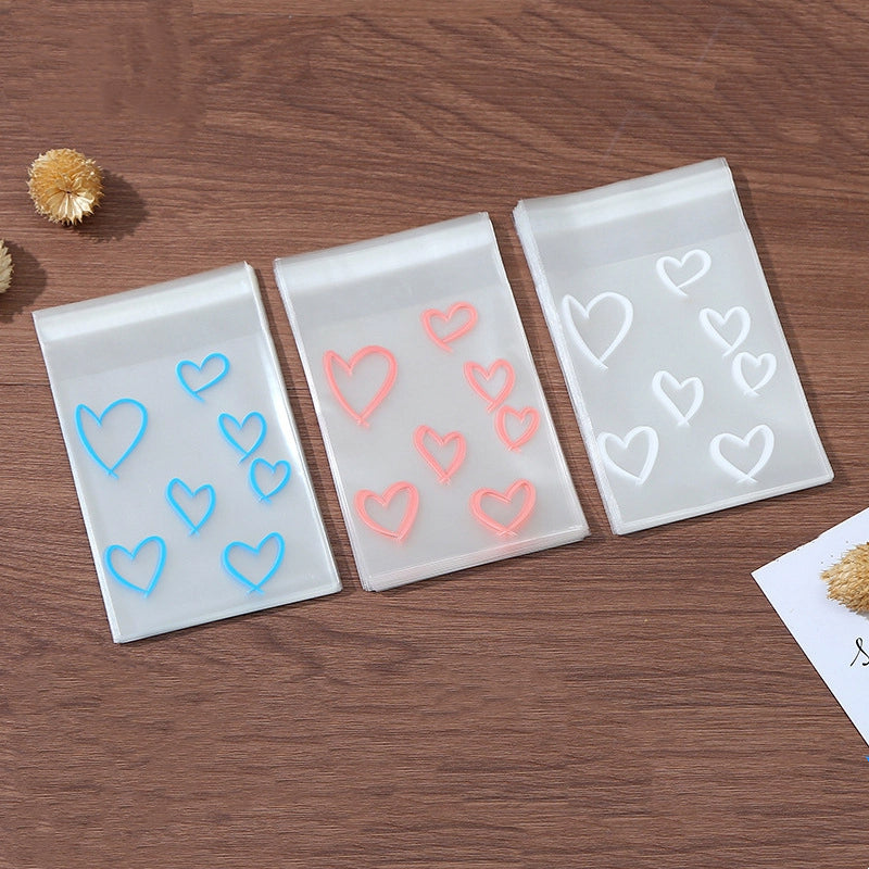 Self Adhesive OPP Bags Hollow Heart Pattern 8x10cm 200pcs